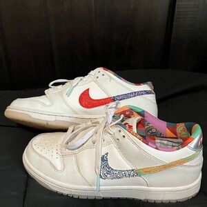 Nike Kids Sneakers in White with Red and Blue Accents